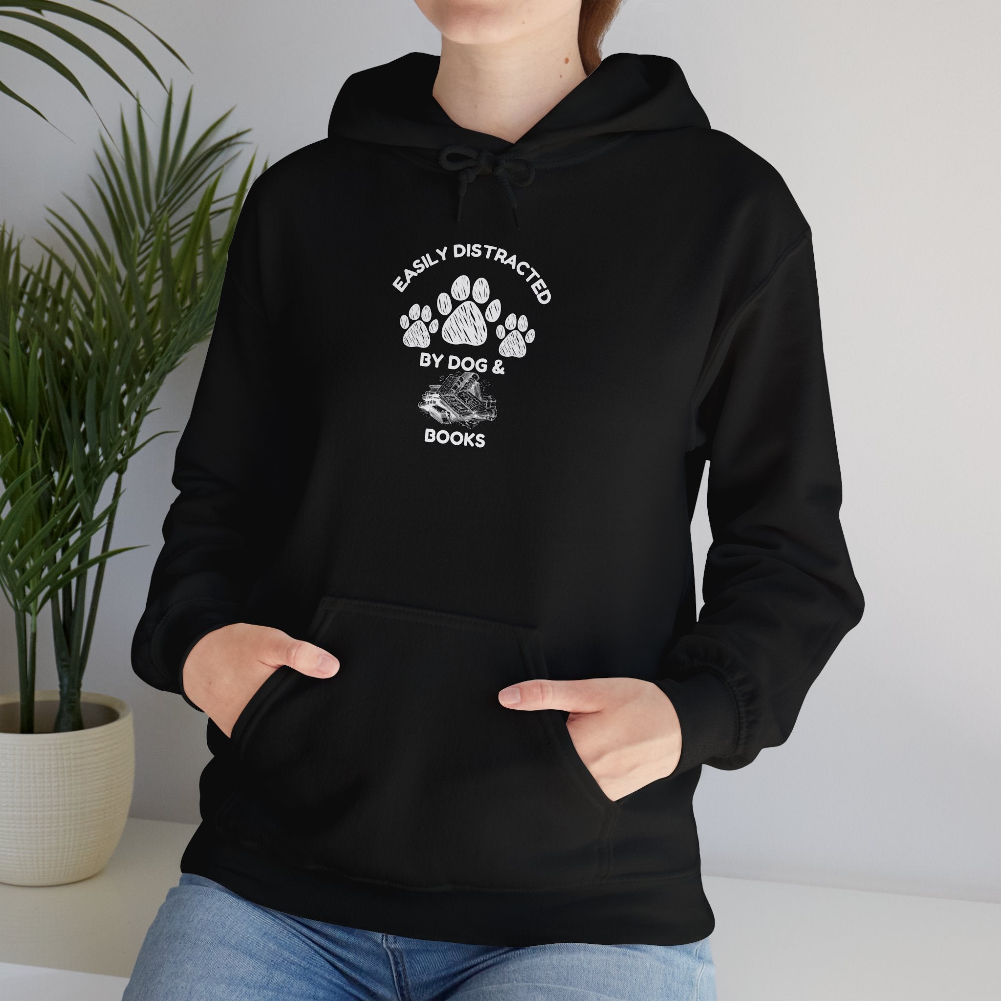 Easily Distracted By Dogs & Books - Funny Pet Lover Tee for Dog Moms | Pet Lovers Cute Pet Tees Animal Moms Women’s Apparel - Pet Lovers Hoodie - Dog Paw Lovers Unisex Heavy Blend™ Hooded Sweatshirt